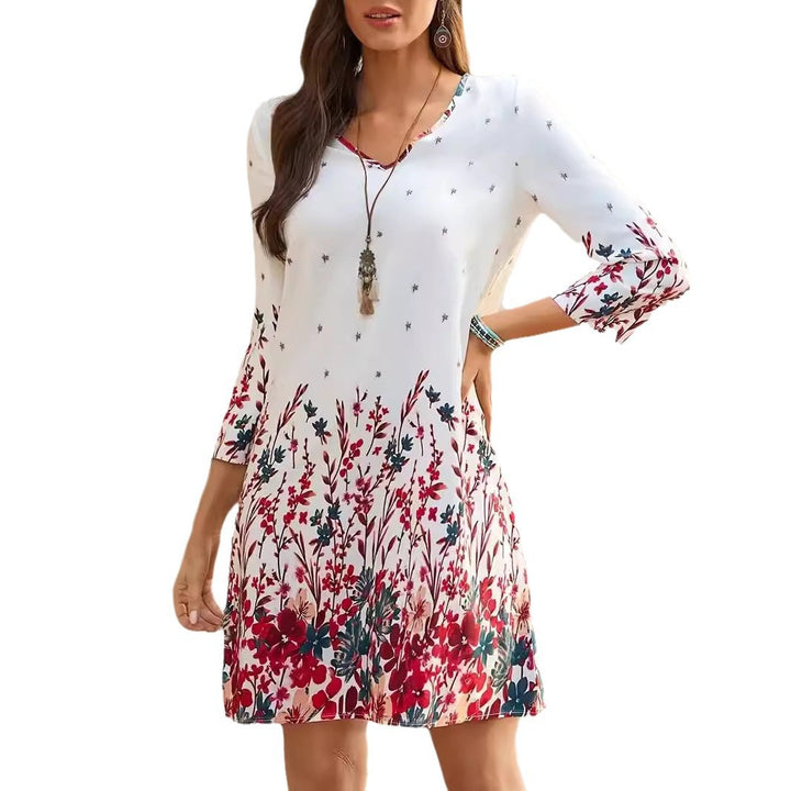 Dame fritidskjole med smart V-hals og floral print Stilla