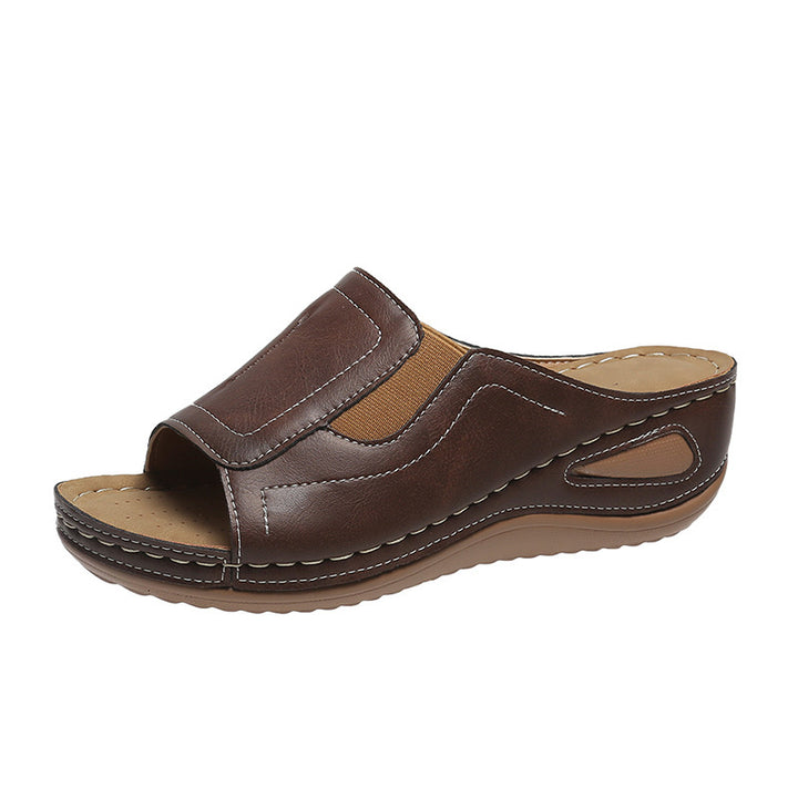 Kvinder komfortable clogs med ergonomisk fodseng og fashionable cut-outs Stilla