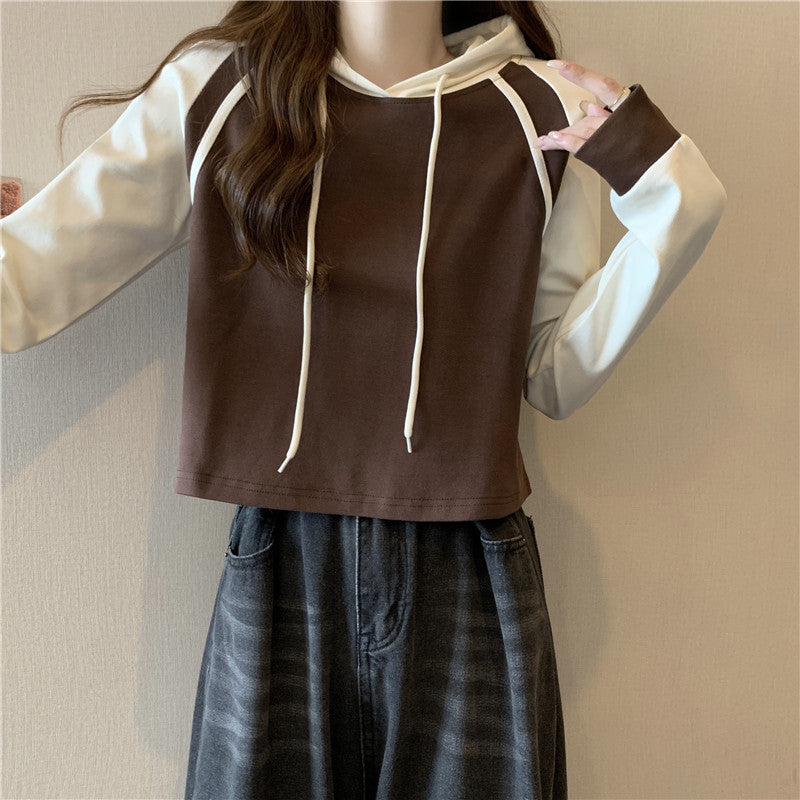 Femme Cropped Pullover Hoodie med kontrastærmer Stilla