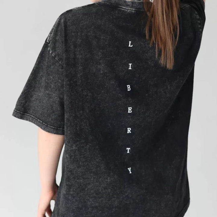 Dame T-Shirt med unikt vintage-effekt og kreativ tekst Stilla