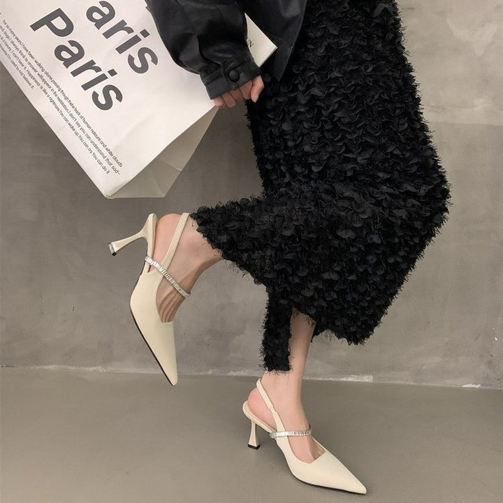 Dame Slingback-pumper med spids tåområde og strasstropdetalje Stilla