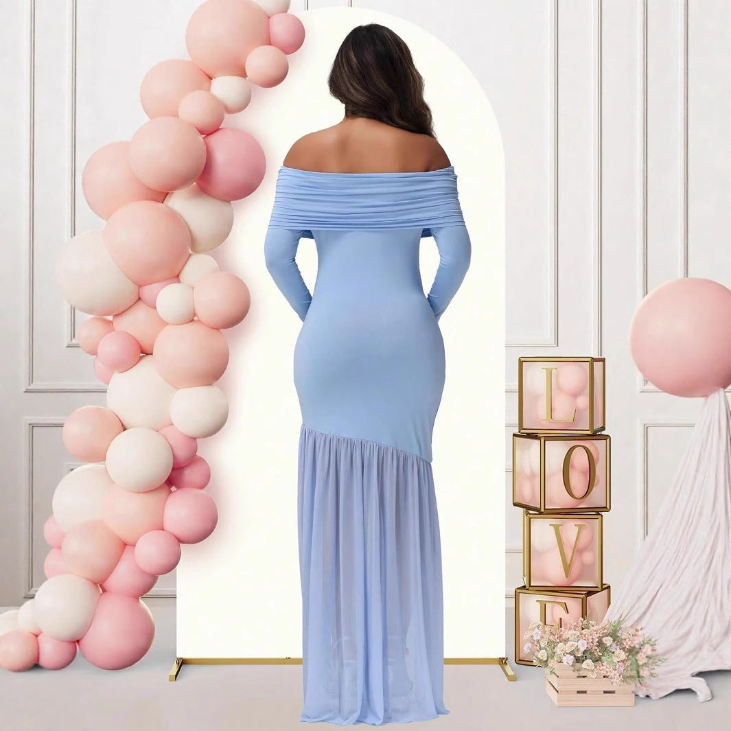 Dame Elegant gravidkjole med off-shoulder design og flydende nederdel Stilla
