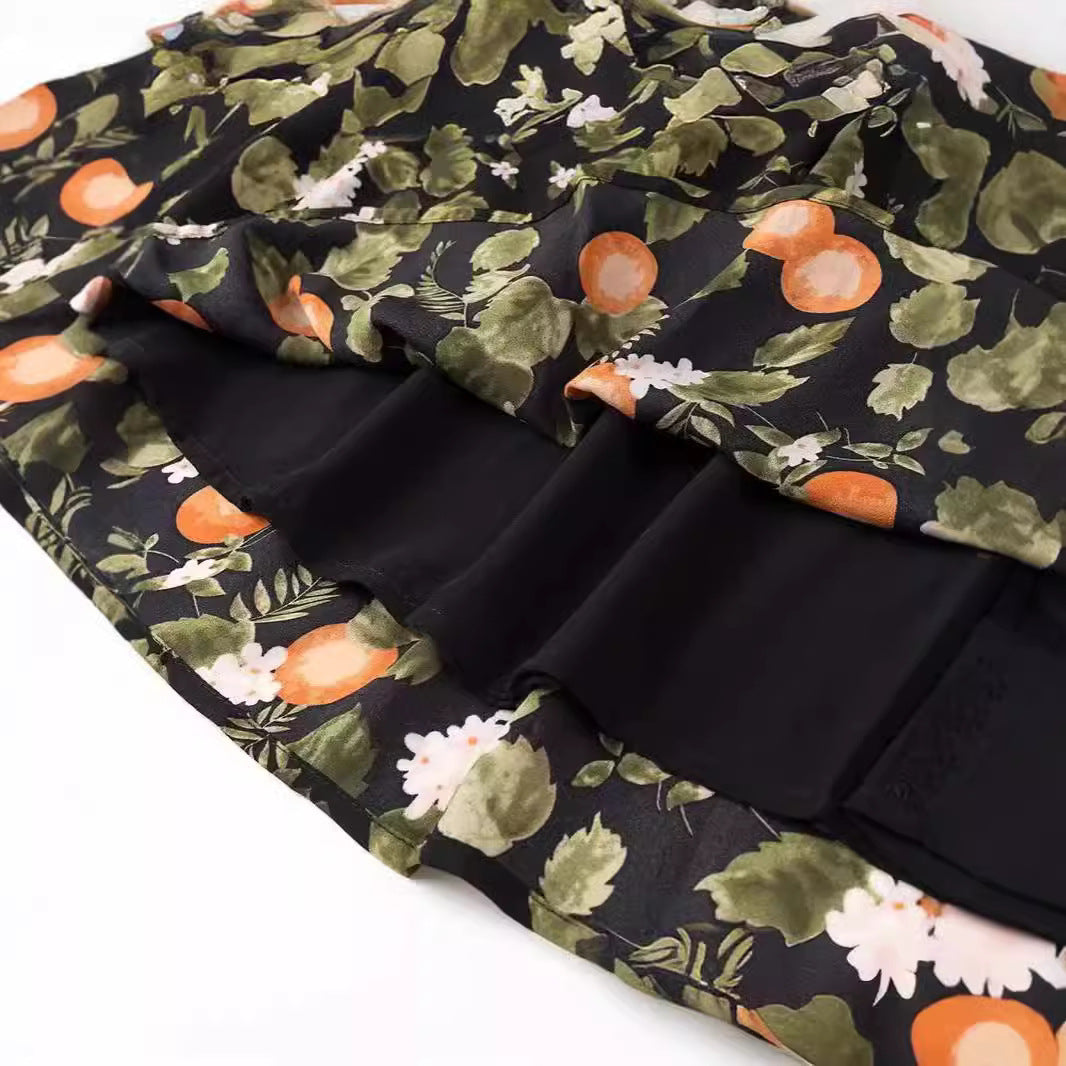 Dame midi-kjole med delikat blomsterprint og elastisk taljebånd Stilla