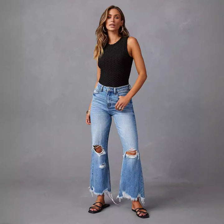 Dame Flared Jeans med modische Ripped-detaljer og frynset kant Stilla