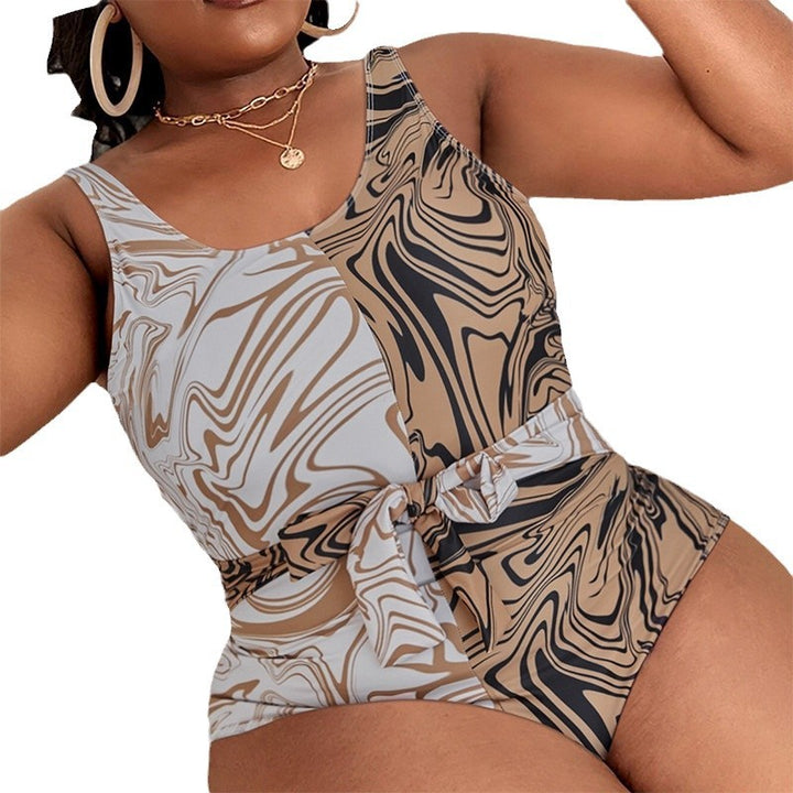 Dame one-piece badedragt med blomster marmordesign og taljeformende bælte Skovae