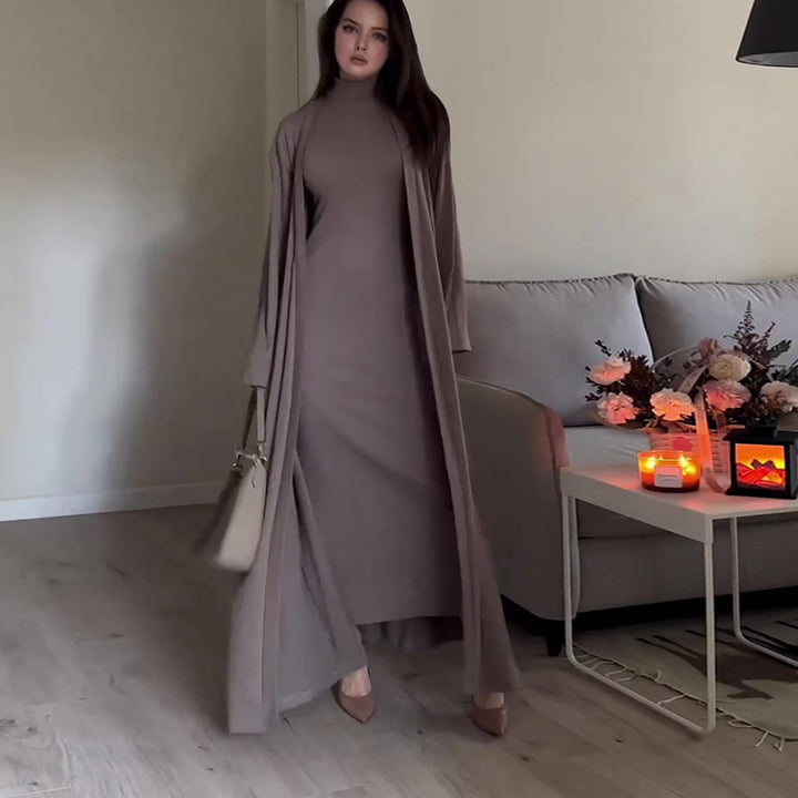 Dame elegant maxikjole med høj krave og bredt skårne ærmer Stilla