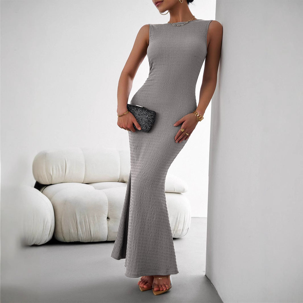 Dame figursyet maxikjole med elegant strukturelt design Skovae