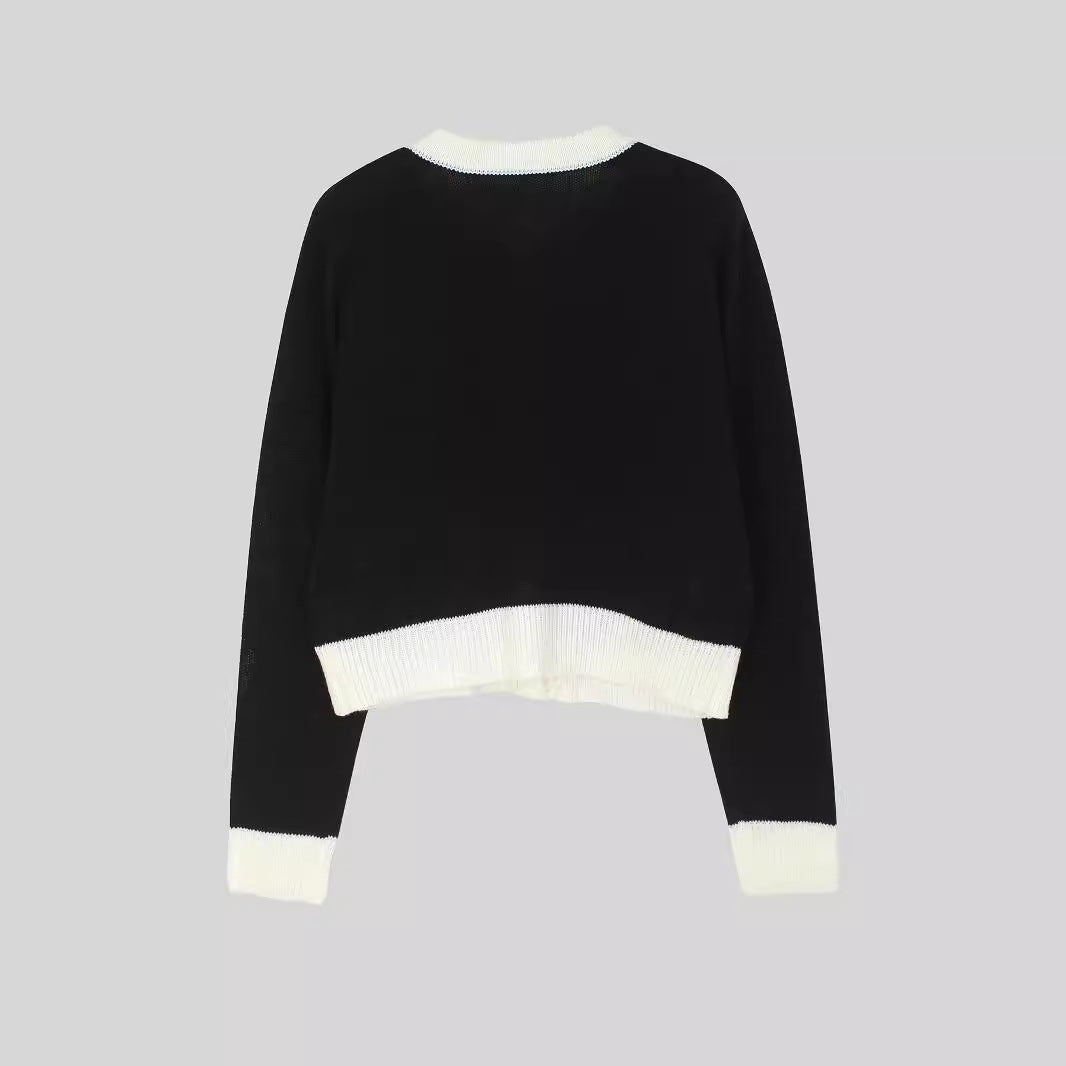 Dame elegant og let strikcardigan med kontrastdetaljer Stilla