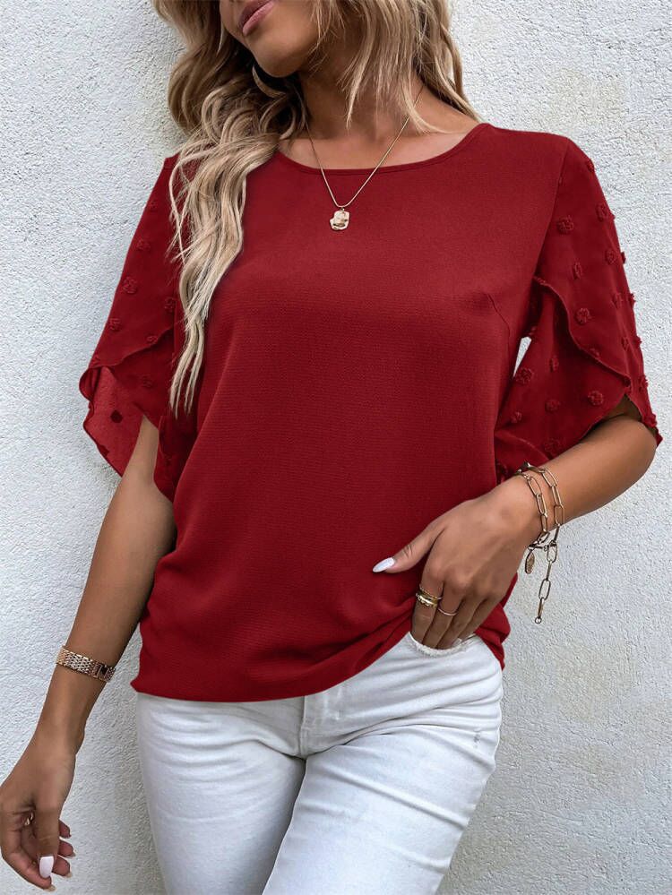 Dame elegant bluse med puffærmer og strukturerede detaljer Stilla
