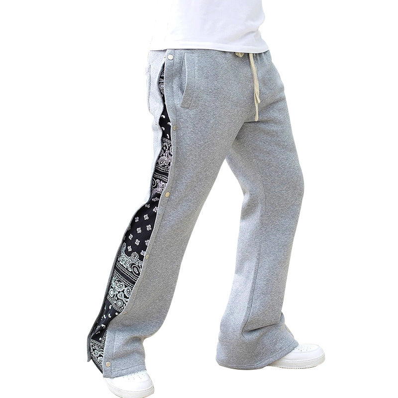 Herrer sporty joggingbukser med kontrasterende sideslids og elastisk talje Stilla