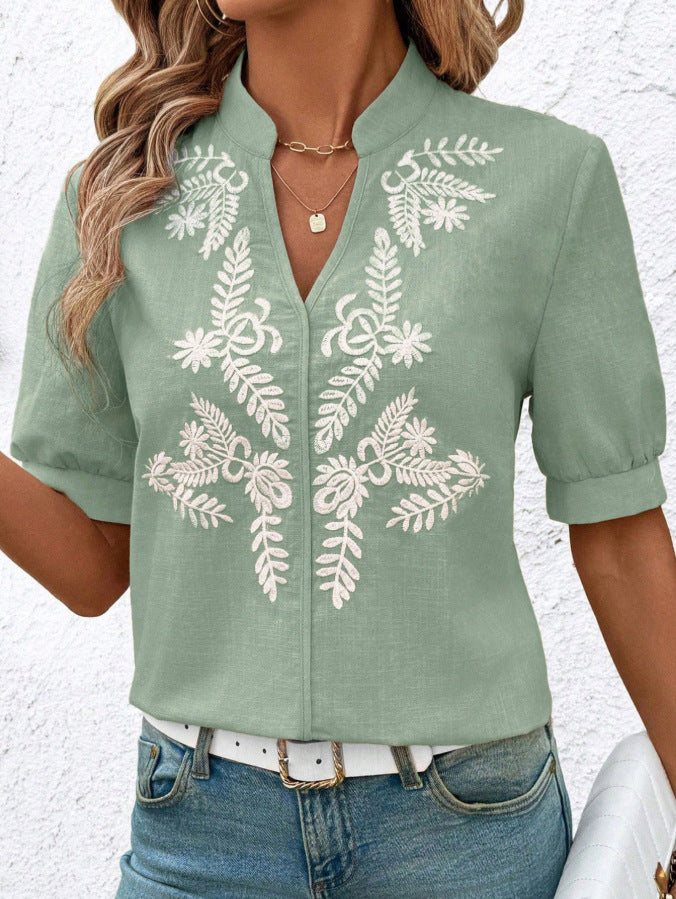 Dame elegant kortærmet bluse med blomstret broderimønster Stilla