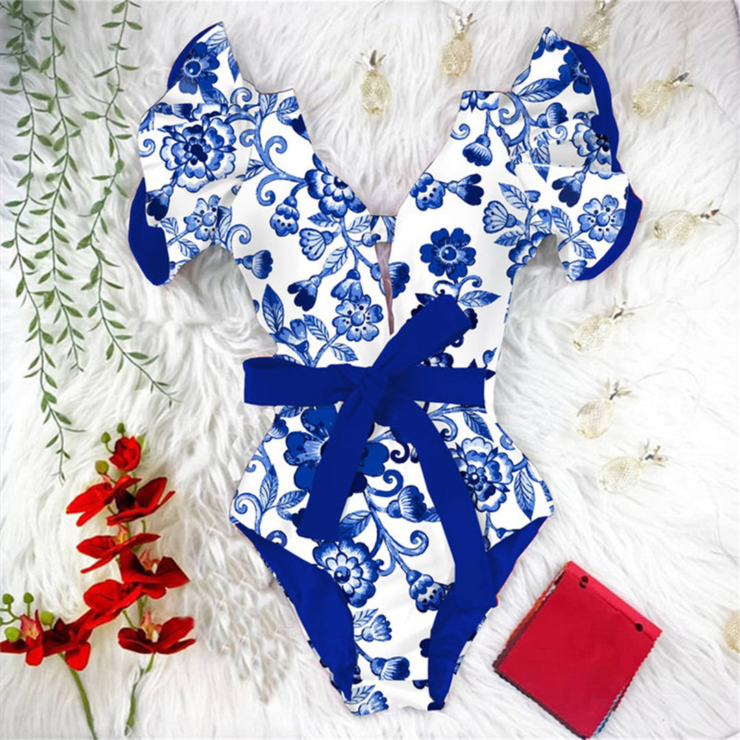 Dame enhed badedragt med blomstret design og elegante flæsedetaljer Stilla