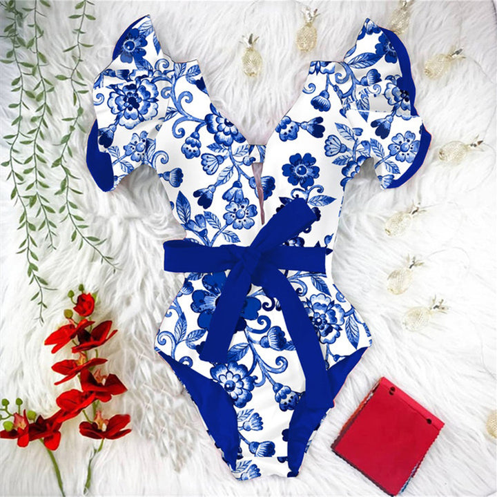Dame enhed badedragt med blomstret design og elegante flæsedetaljer Stilla