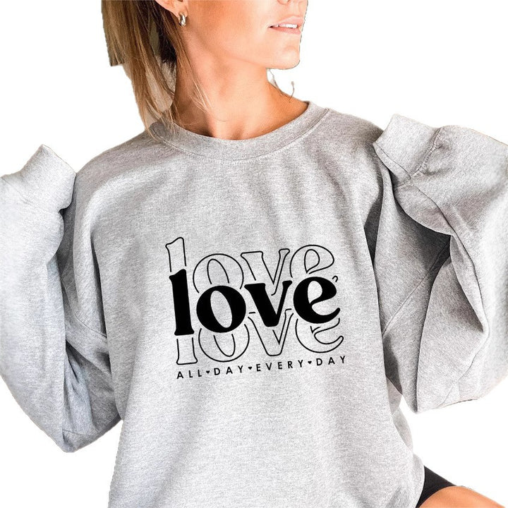 Kvinders sweatshirt med voluminøse ærmer og moderne kærlighedsprint Stilla