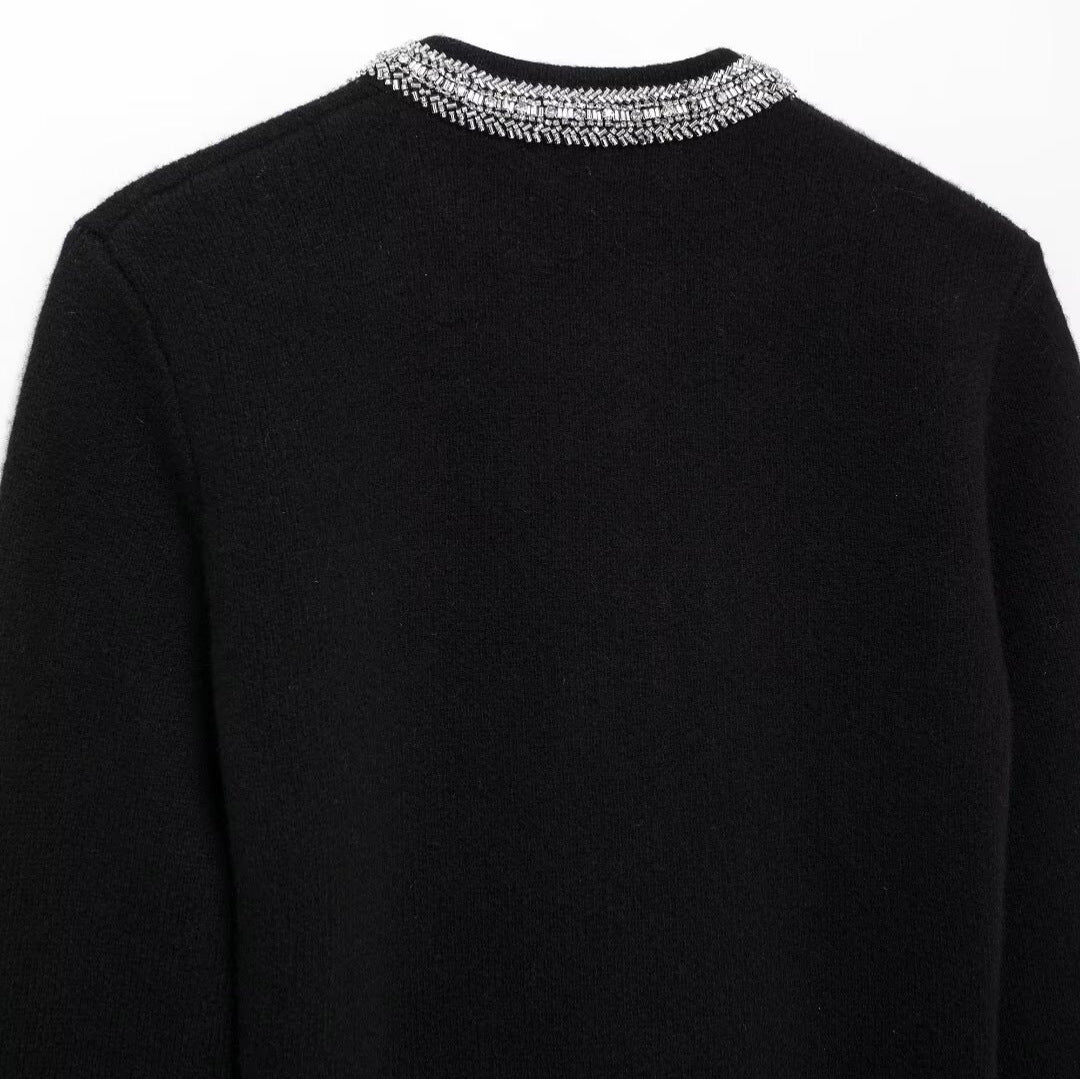 Dame Elegant strikcardigan med dekorativt pynt Stilla
