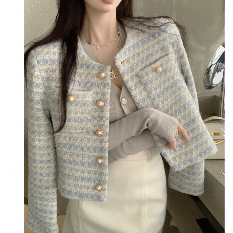 Kvinder Elegant og stilfuld tweed jakke med perleknapper Skovae