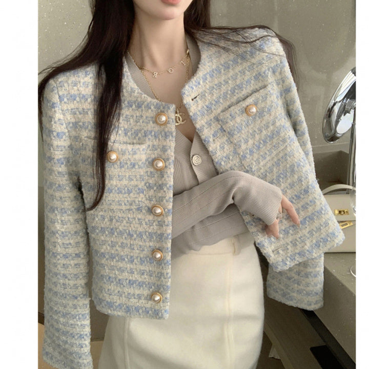 Kvinder Elegant og stilfuld tweed jakke med perleknapper Skovae