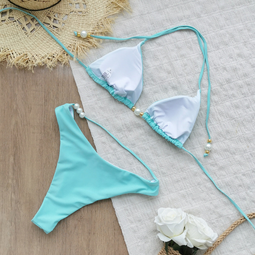 Dame bikini-sæt med moderne trekants-top og elegant perle-detalje Stilla