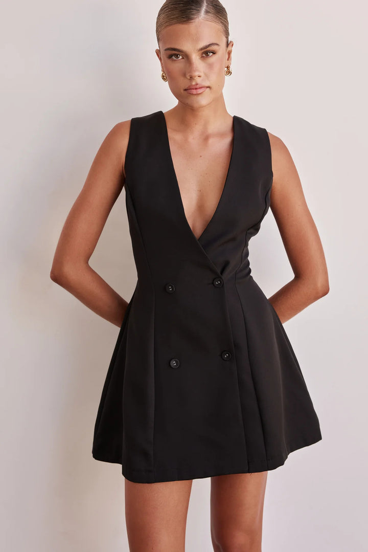 Women's reversible dress with deep V-neckline and double button placket Skovae