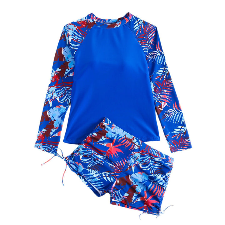 Dame Surf-dragt med langærmet skjorte og moderigtige shorts Stilla