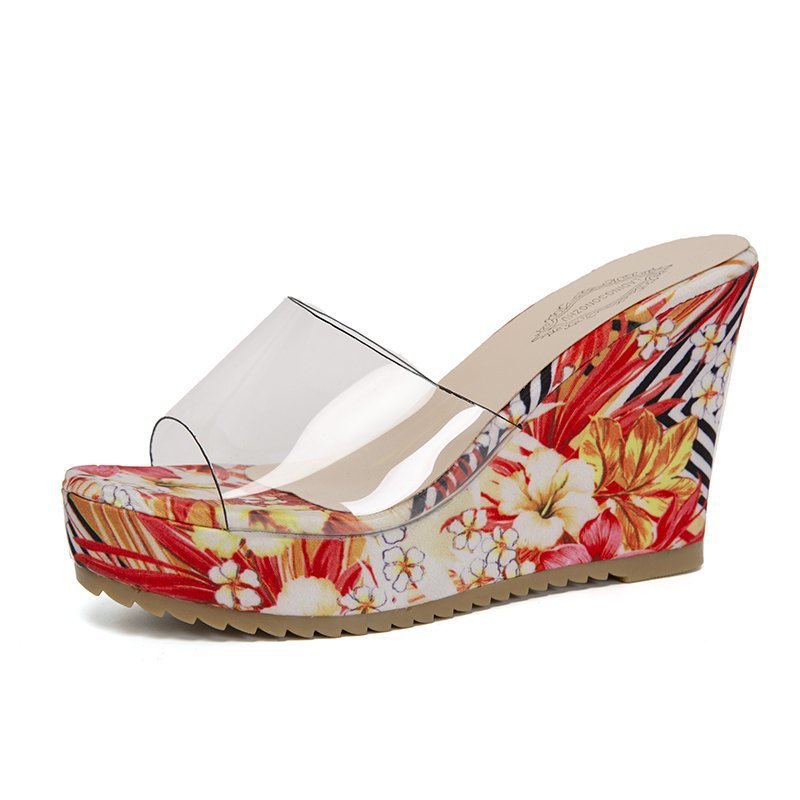 Dame højhælede wedge-sandaler med gennemsigtig remføring og blomsteragtige accenter Stilla