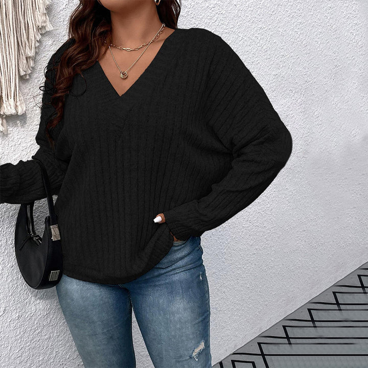 Dame løs sweater med V-hals og ribstruktur Stilla