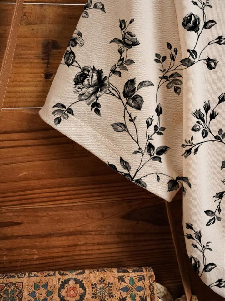 Dame T-shirt med blomsterapplikationer og rund halsudskæring Stilla