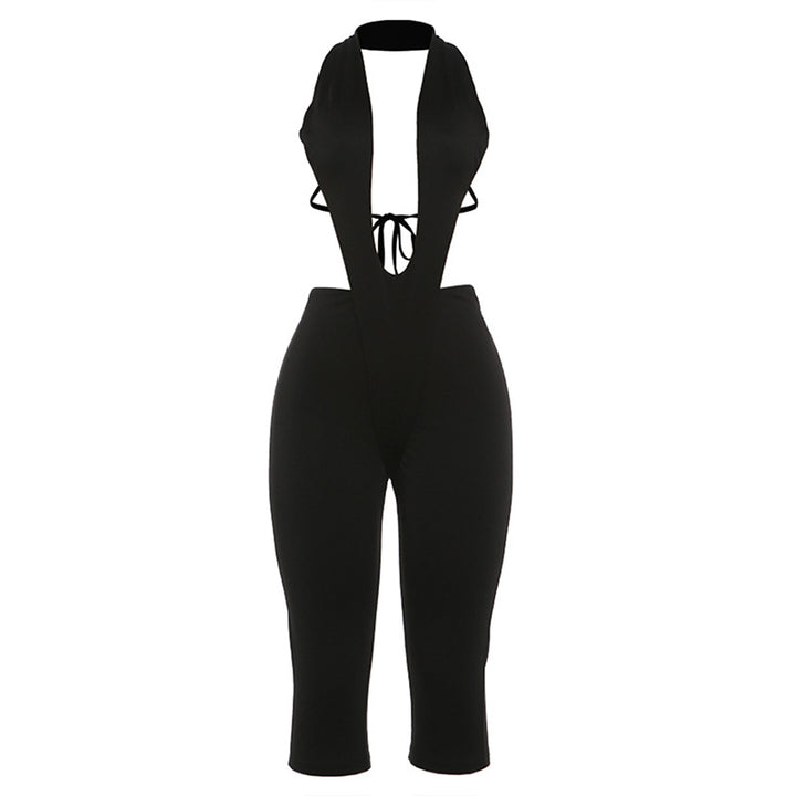 Dame figursyet jumpsuit med dyb V-udskæring og bælte Skovae