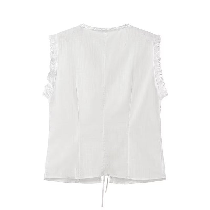 Damebluse med dekorative flæsedetaljer og elegant V-hals Stilla