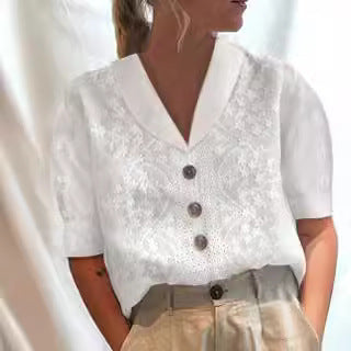 Damebluse med blomsterbroderier og klassisk krave Stilla