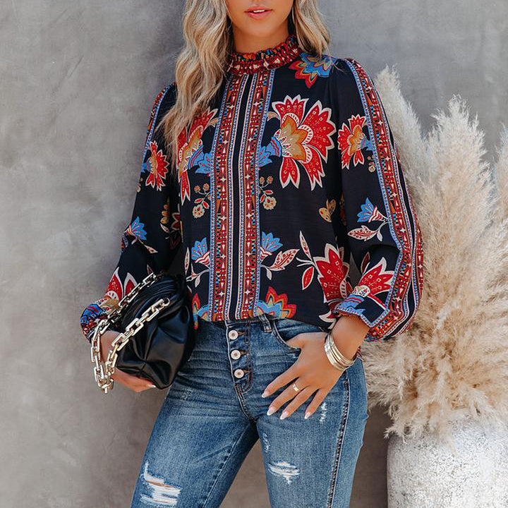 Damer modebluse med puffærmer og blomstret design Stilla