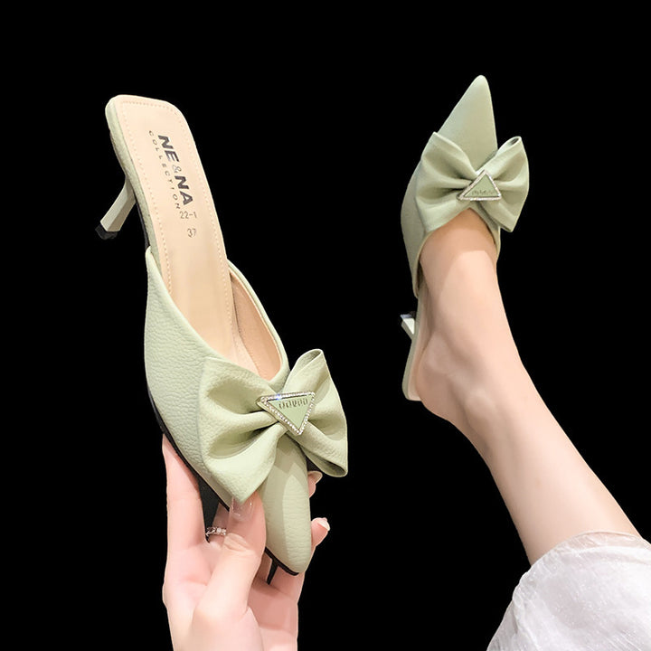 Dame Slingback-sandaler med dekorativ sløjfe-applikation og elegant spids-design Stilla