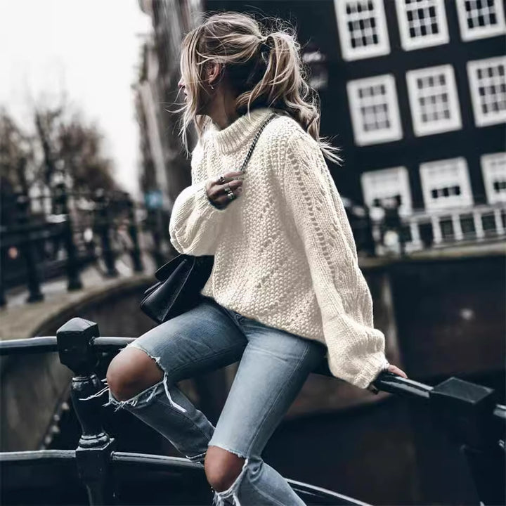 Dame Grovstrik pullover med høje ærmer og moderne hulmønster Stilla