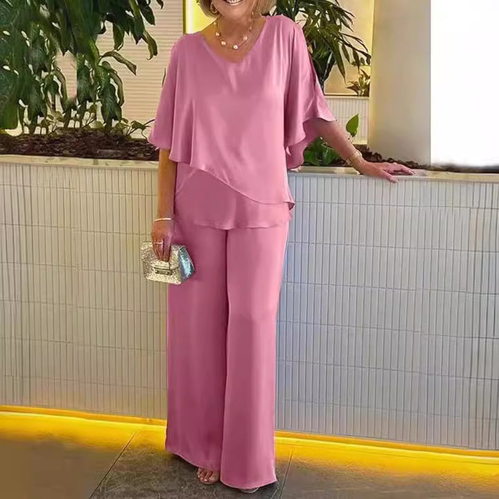 Dame elegant kombination af flydende overdel og vide buksedesign Stilla