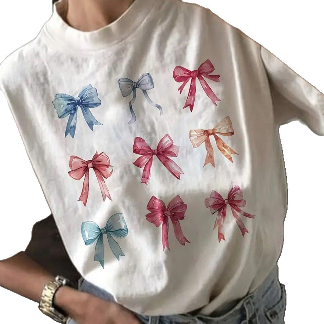 Dame T-shirt med charmerende sløjfemotiv og afslappet snit Stilla