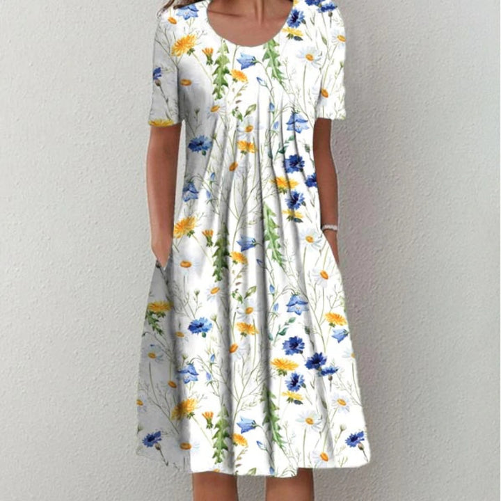 Dame fritidskjole med blomstret design og praktiske lommer Stiila