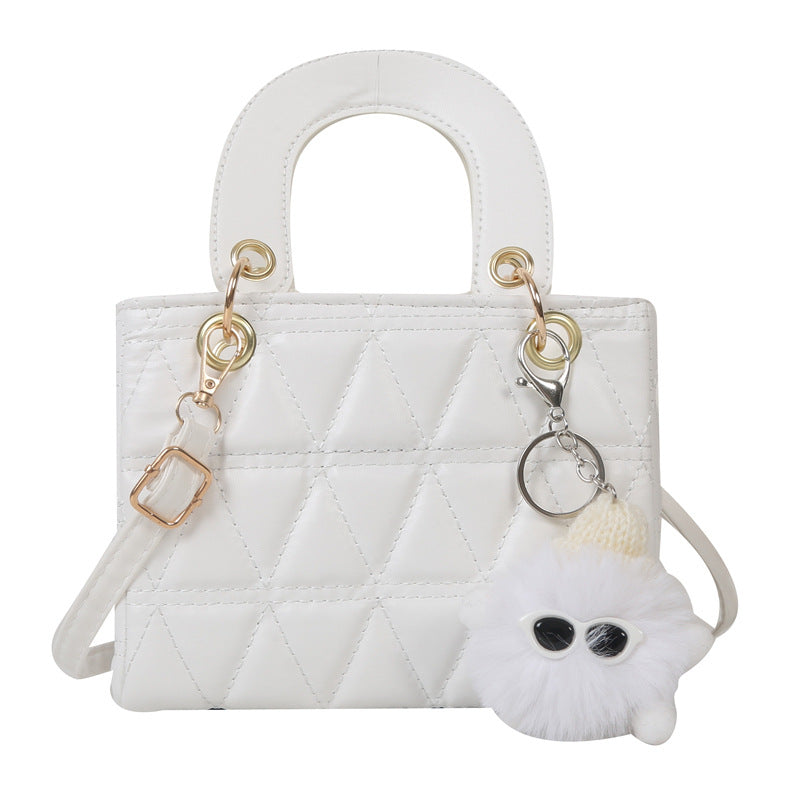 Femme quilted håndtaske med aftagelig charme Stilla