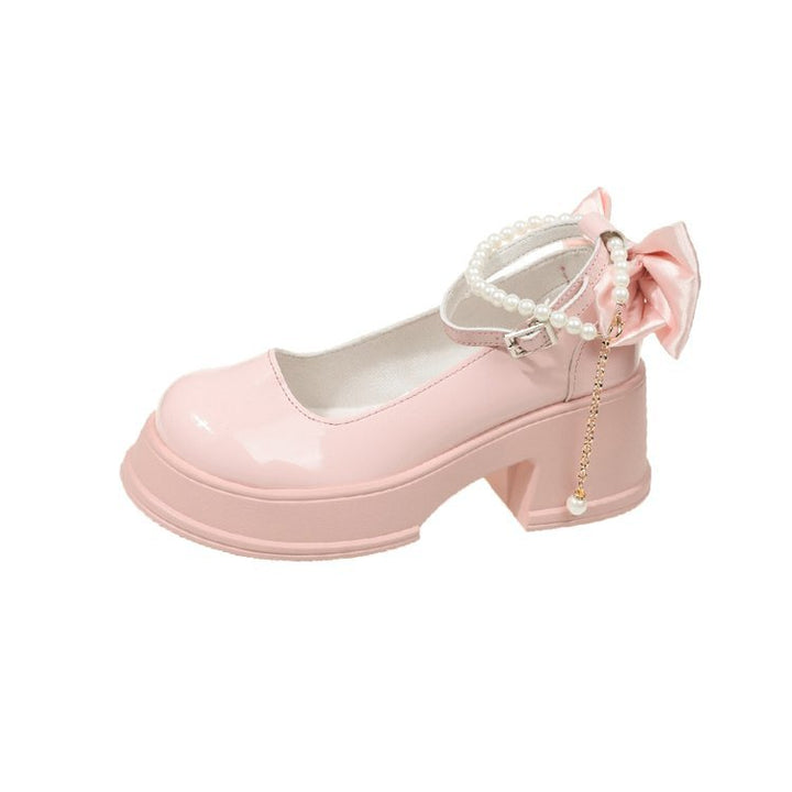 Dame elegante pumps med dekorativ ankelrem og stilfuld sløjfe accent Stilla
