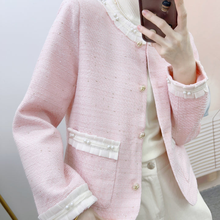 Dame elegant Bouclé-jakke med dekorative perlemorsknapper og struktureret design Stilla