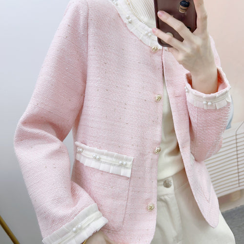 Dame elegant Bouclé-jakke med dekorative perlemorsknapper og struktureret design Stilla