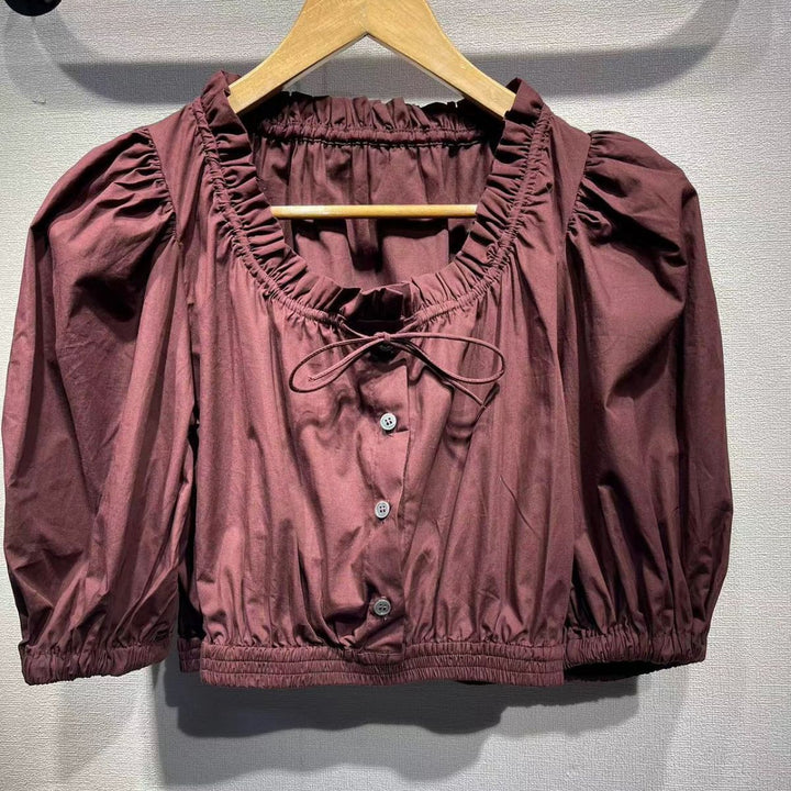 Dame kortærmet bluse med elastisk kant og romantiske puffærmer Stilla
