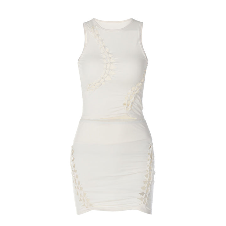 Dame Sæt bestående af sporty top og figursyet miniskørt med trendy cut-out-detaljer Stilla