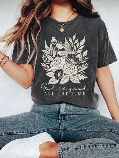 Dame T-shirt med floralt motiv og inspirerende tekst Stilla