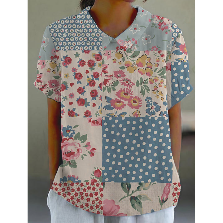 Dame kortærmet bluse med florale accenter og klassisk krave Skovae