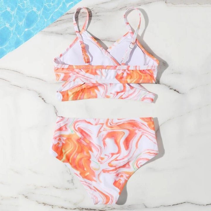 Dame Tankini-sæt med elegant indpakningsoberdel og højskårne shorts Stilla