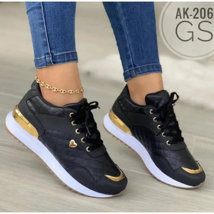 Dame sporty sneakers med elegant guldaccent og åndbart overmateriale Stilla