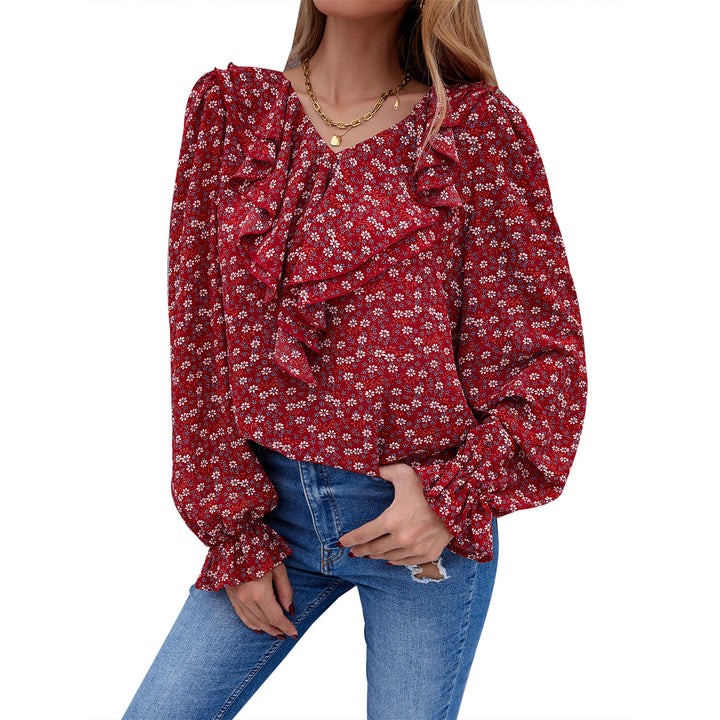 Kvinders bluse med flæsedetaljer og blomsterprint Stilla