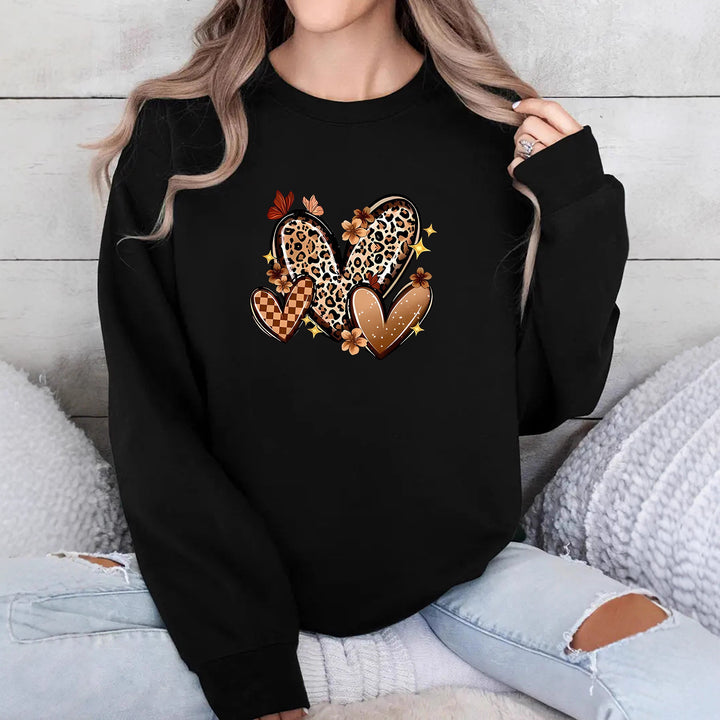 Kvinders sweatshirt med attraktive hjerte motiv.