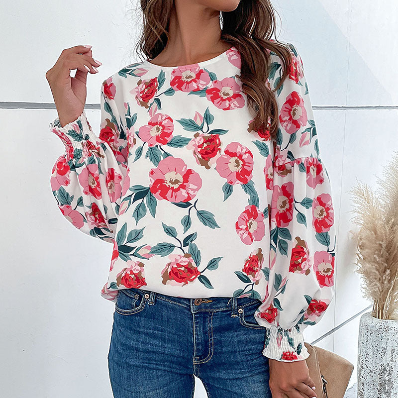 Damebluse med blomstertryk og voluminøse ærmer Stilla
