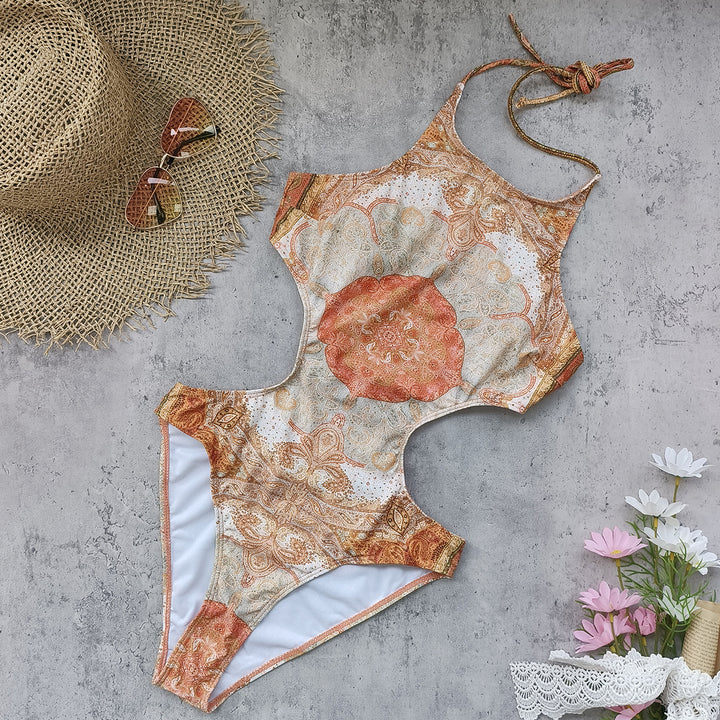Dame badedragt med blomster cut-out design og elegant trusse Stilla